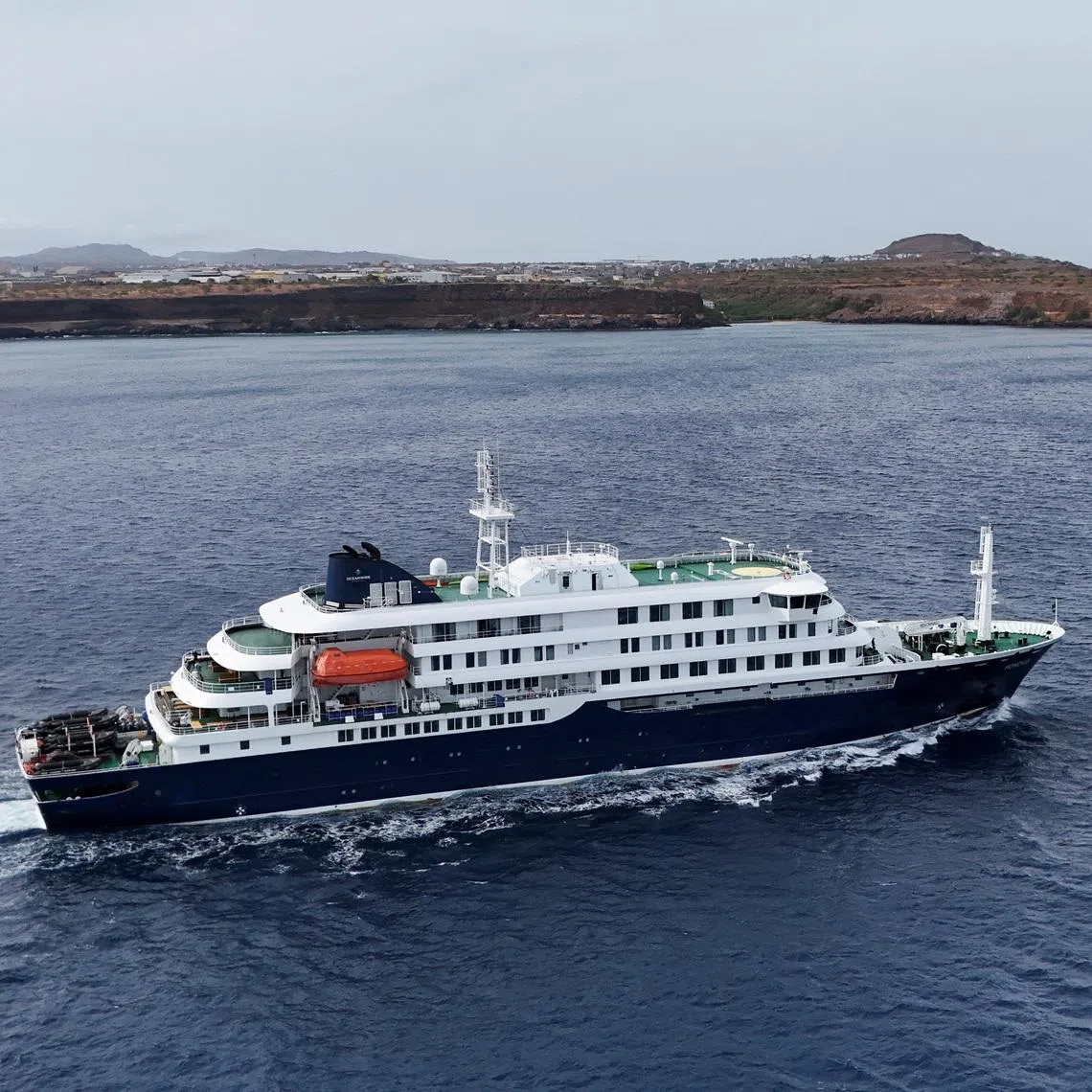 A drone view of the cruise ship MV Hondius, carrying passengers suspected of having cases of hantavirus on board, leaves Praia, Cape Verde, May 6, 2026.