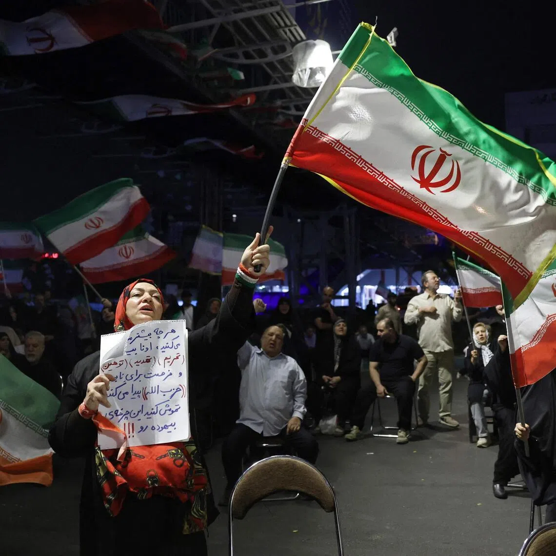 Protesters wave Iran’s flag during an anti-US and anti-Israel protest in Tehran on May 29, 2026.
