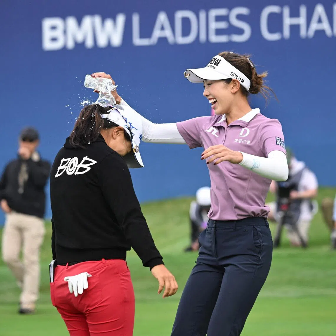 South Korea's Kim Sei-young getting drenched by Yealimi Noh of the United States after winning the BMW Ladies Championship in Haenam, South Korea, on Oct 19.