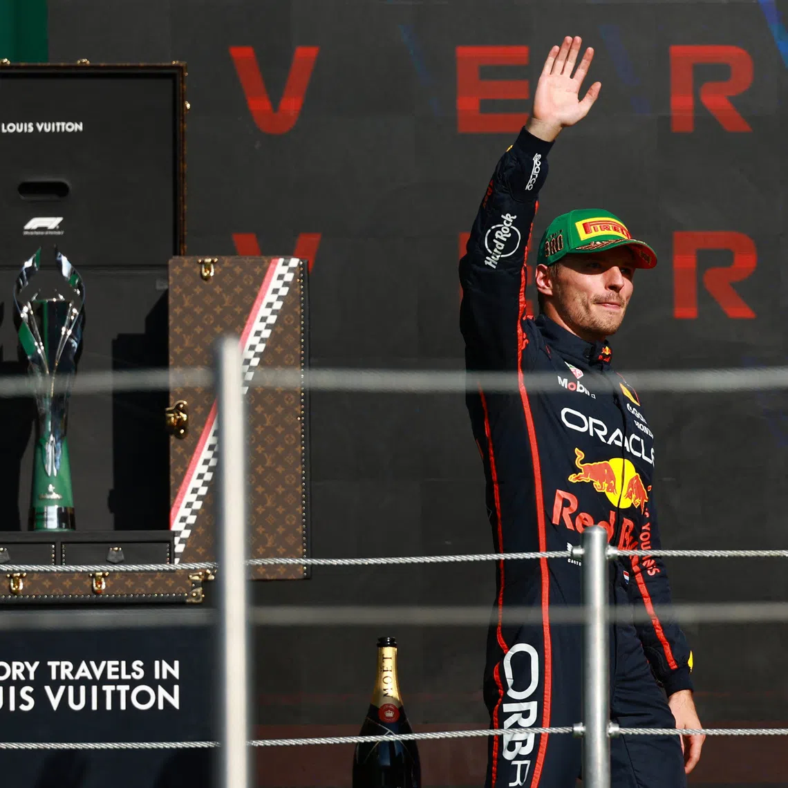 Formula One F1 - Mexico City Grand Prix - Autodromo Hermanos Rodriguez, Mexico City, Mexico - October 26, 2025 Red Bull's Max Verstappen celebrates on the podium after finishing third place in the Mexico City Grand Prix REUTERS/Raquel Cunha