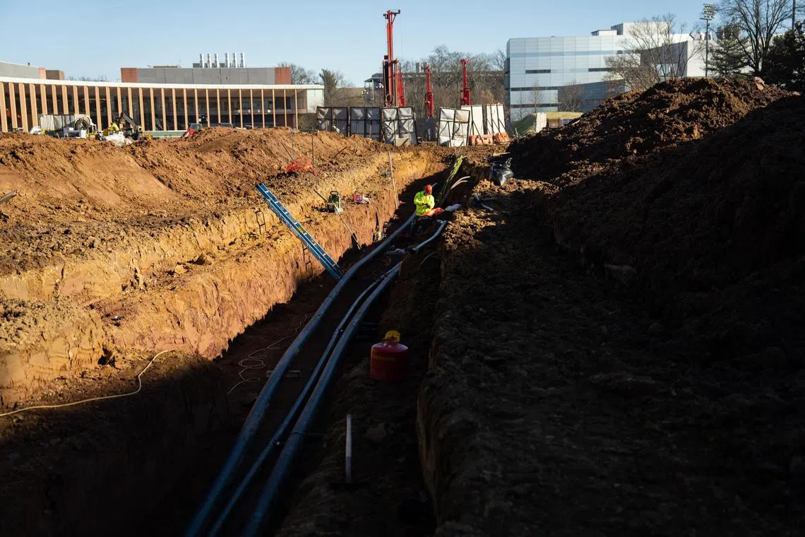 Construction of the new geo-exchange facilities in Princeton University’s campus in Princeton, N.J., on Dec. 15, 2023. A growing number of colleges and universities are using deep underground pipes to heat and cool their buildings without burning fossil fuels. (Maansi Srivastava/The New York Times)