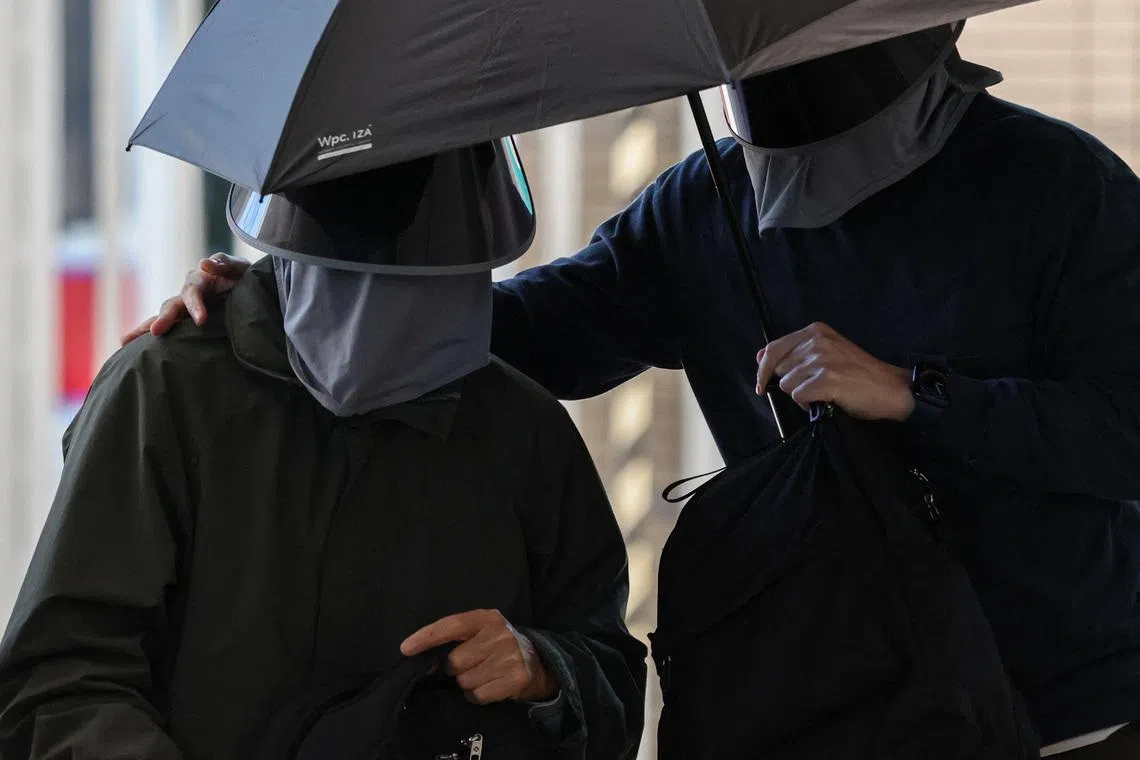 Kwok Yin-sang, father of wanted U.S.-based activist Anna Kwok, arrives at the West Kowloon Magistrates’ Courts building in Hong Kong, China, February 11, 2026. REUTERS/Tyrone Siu
