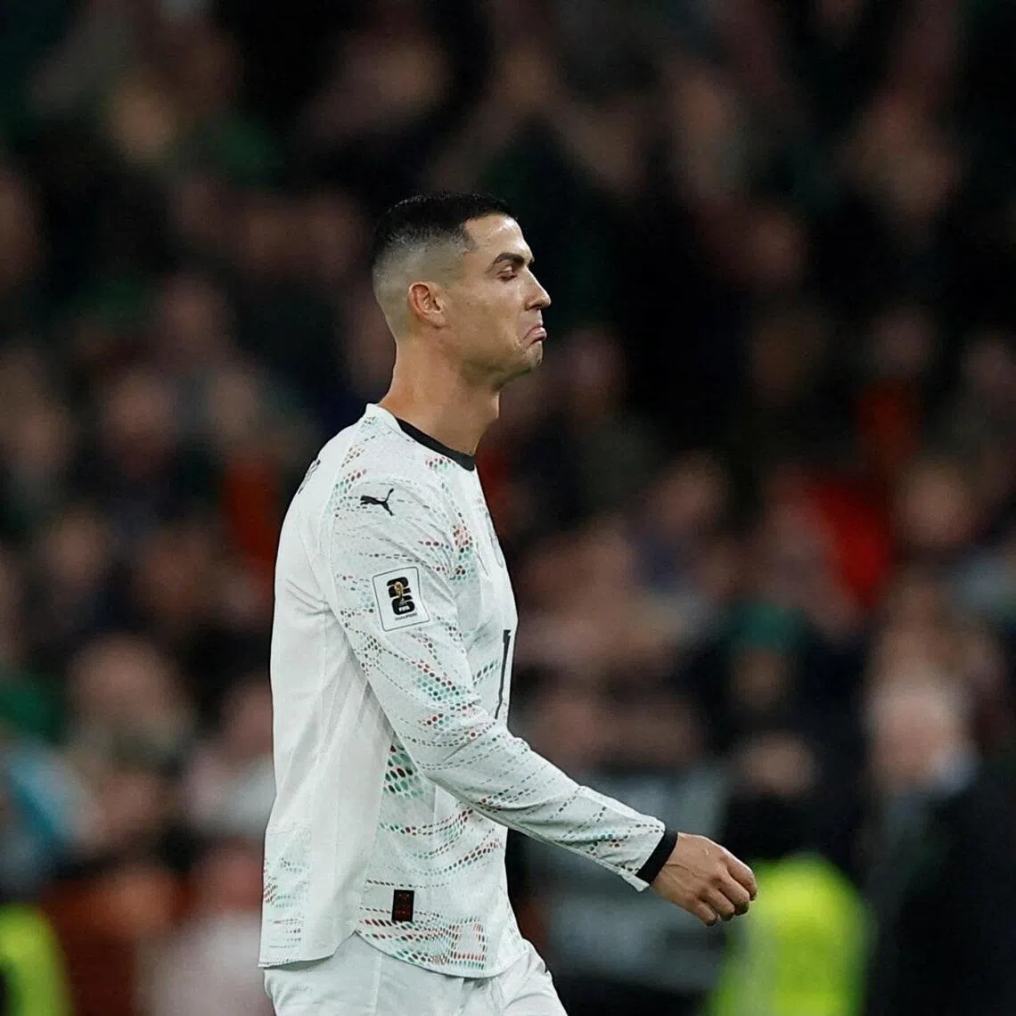 Portugal's Cristiano Ronaldo walking off after being shown a red card during the World Cup qualifier against the Republic of Ireland in Dublin on Nov 13. 