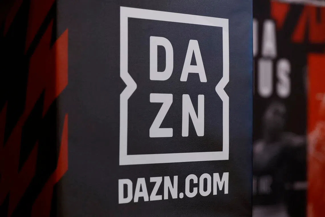 FILE PHOTO: Boxing - Anthony Joshua and Robert Helenius Press Conference - Pan Pacific London, London, Britain - August 9, 2023 A DAZN signage is pictured during the press conference Action Images via Reuters/Peter Cziborra/File Photo