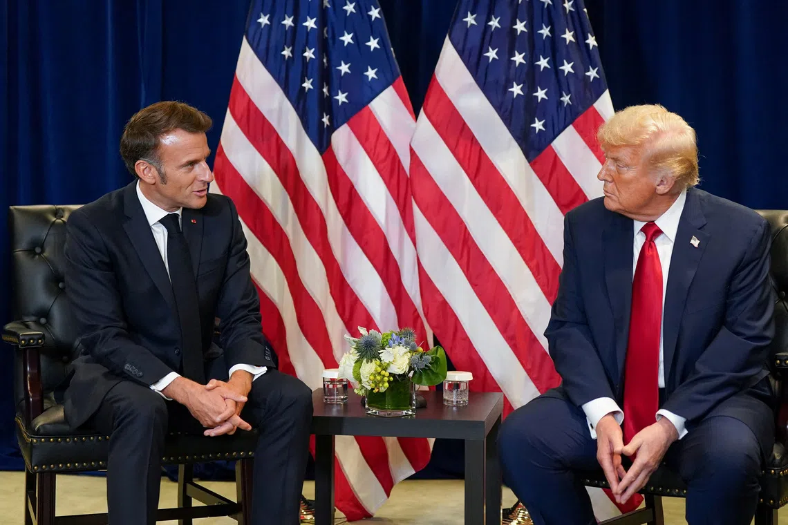 U.S. President Donald Trump meets with French President Emmanuel Macron during the 80th United Nations General Assembly, in New York City, New York, U.S., September 23, 2025. REUTERS/Al Drago
