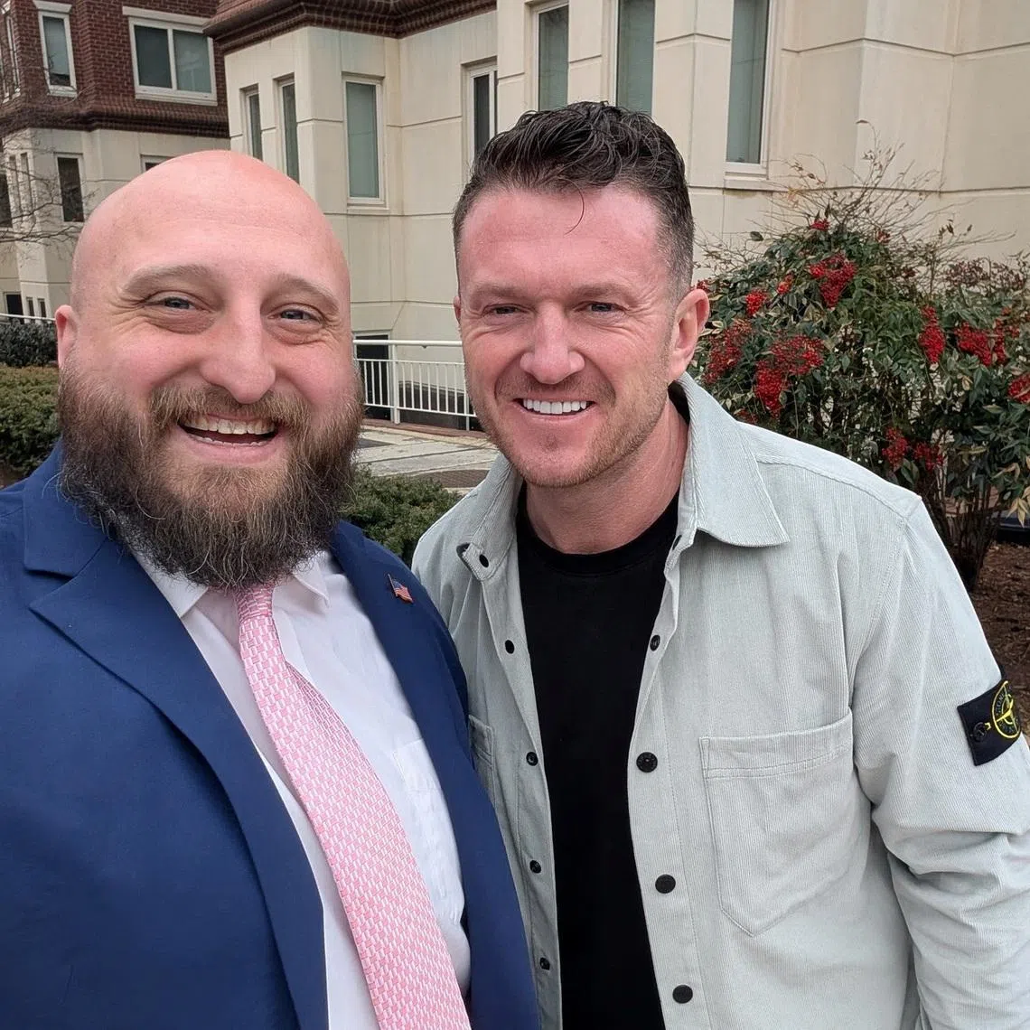 British far-right anti-Islam activist Tommy Robinson, whose real name is Stephen Yaxley-Lennon, poses for a photo with U.S. State Department official Joe Rittenhouse in Washington, D.C., U.S., February 25, 2026. Joe Rittenhouse via X/Handout via REUTERS