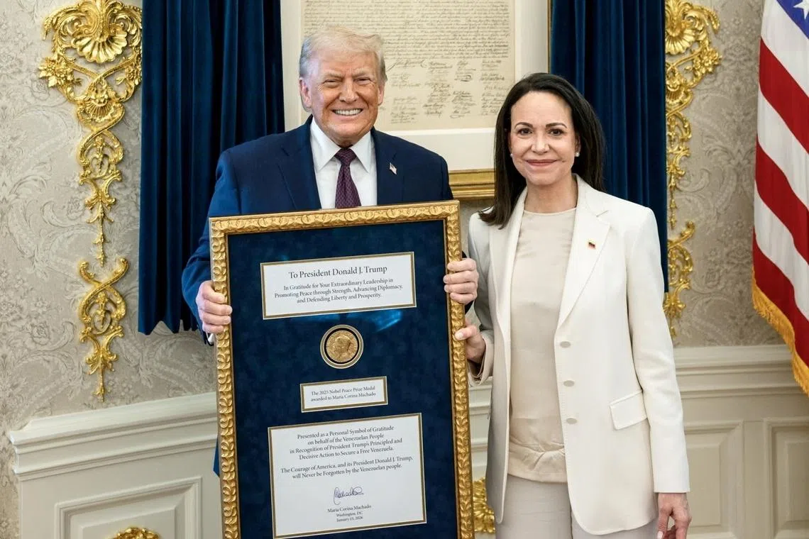 Venezuelan opposition leader Maria Corina Machado presented US President Donald Trump with her Nobel Peace Prize medal in the Oval Office, on Jan 15.