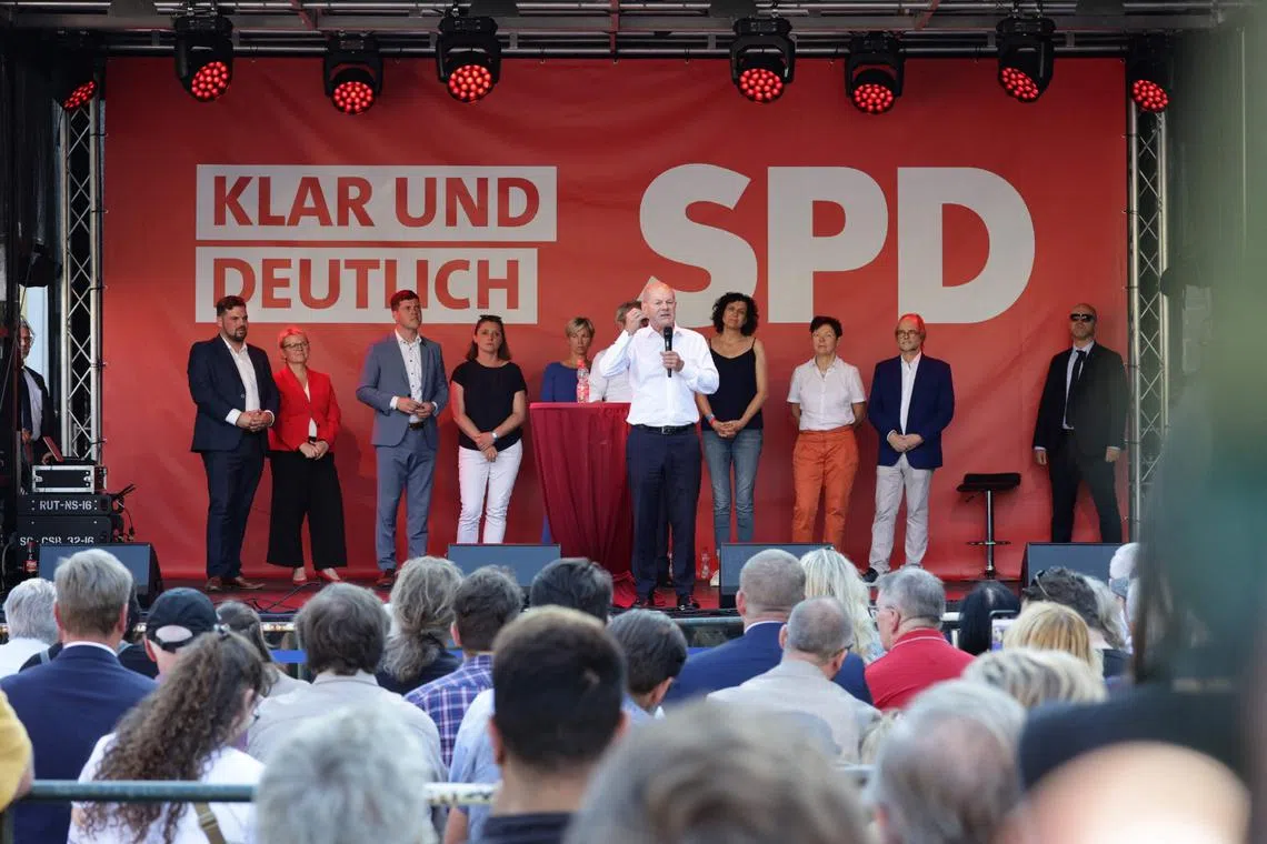 German Chancellor Olaf Scholz on stage in Jena, eastern Germany, on Aug 27. He faced a wall of boos from locals furious about the Aug 23 terror attack in Solingen.