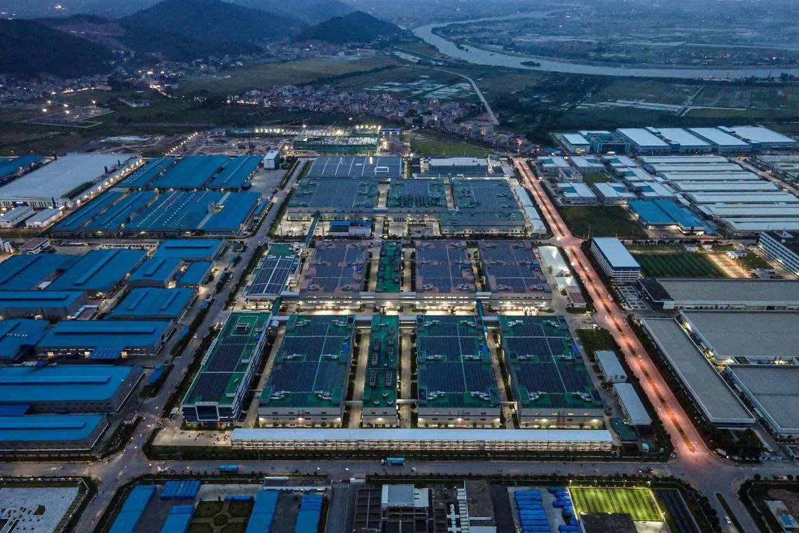 Apple supplier Foxconn’s factory (left) in Quang Chau Industrial Park in Bac Giang province, Vietnam. 