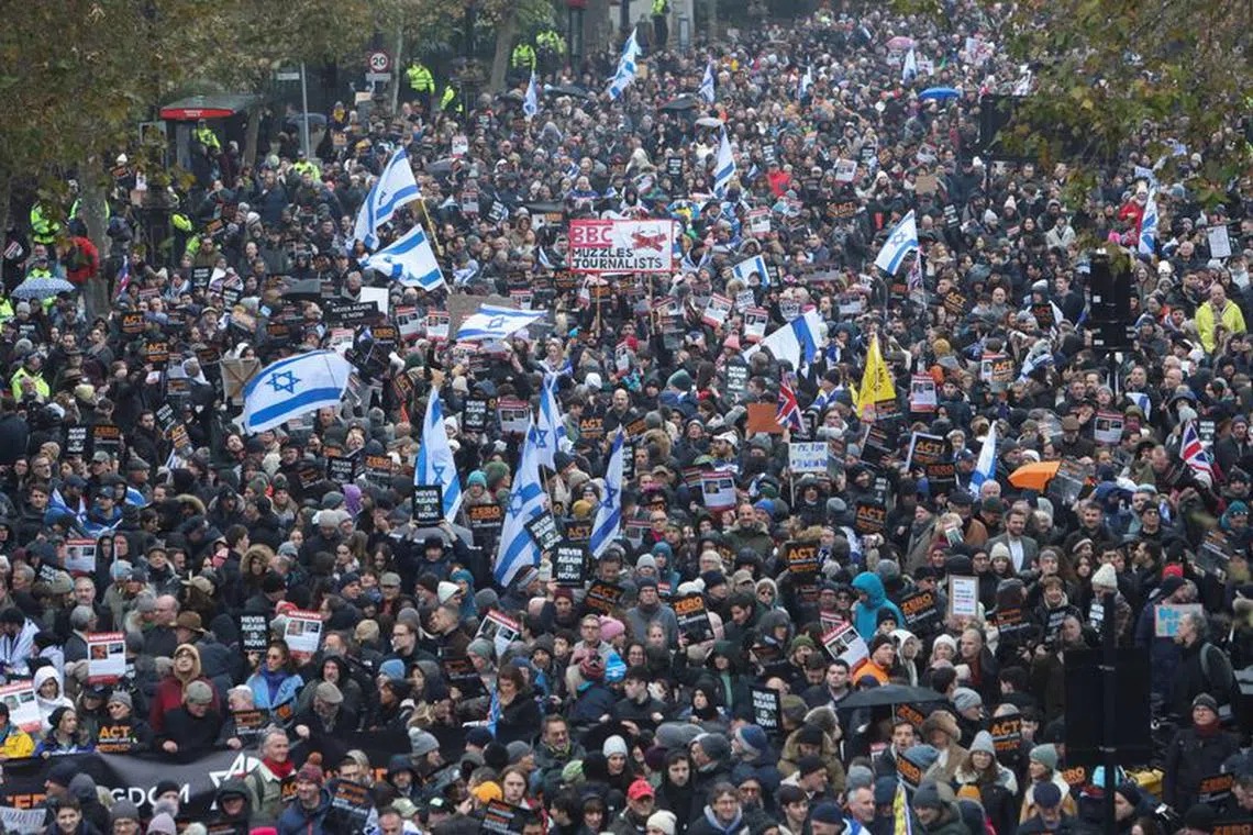Demonstrators march against the rise of antisemitism in the UK, during a temporary truce between the Palestinian Islamist group Hamas and Israel, in London, Britain November 26, 2023. REUTERS/Susannah Ireland