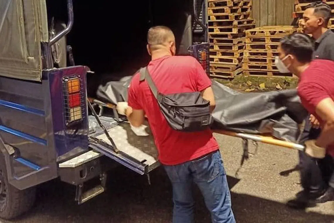 A man's body taken away after 