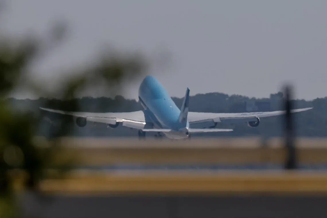 A Korean Air Lines Boeing 747-800 charter flight departs the US for Seoul, South Korea, with previously detained Korean workers on board on Sept 11.