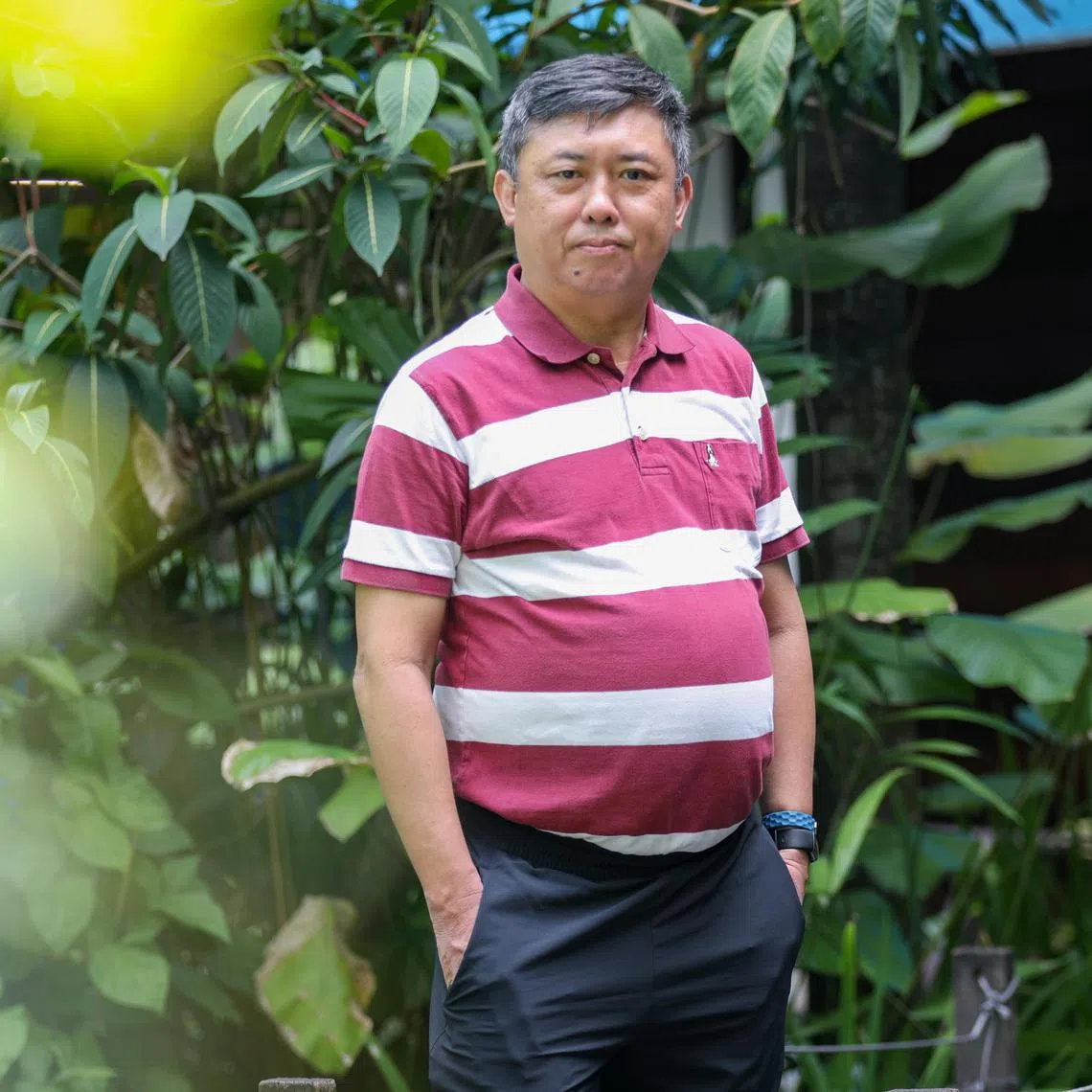 Shots of Mr Chang Cheng Hwee, 56, who started the chess club in 1996 at Northland Primary School and has been coaching ever since.