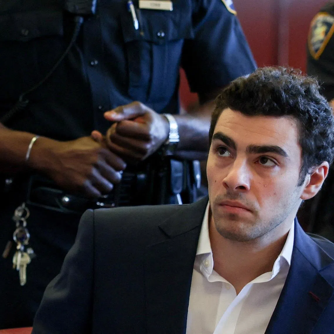 FILE PHOTO: Luigi Mangione attends an evidentiary hearing in the murder case of UnitedHealthcare CEO Brian Thompson, at the Manhattan Supreme Court in New York, U.S., December 18, 2025. REUTERS/Shannon Stapleton/Pool/File Photo