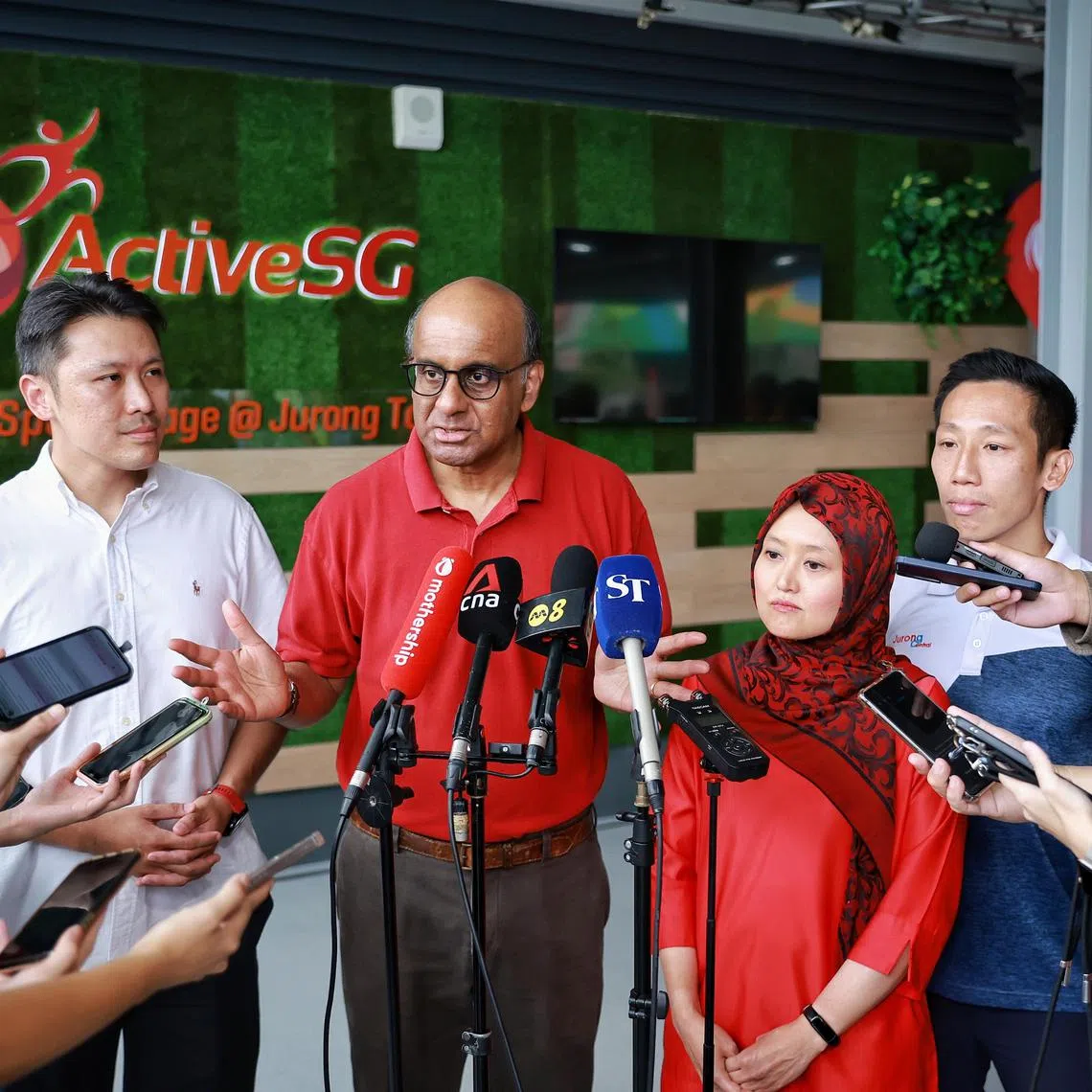 Senior Minister Tharman Shanmugaratnam (second from left) and Jurong GRC MPs (from left) Shawn Huang, Rahayu Mahzam and Xie Yao Quan at the opening of ActiveSG Sport Village @ Jurong Town on Sunday. 