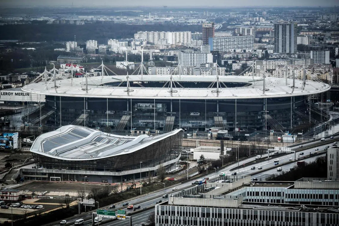 A view of the Aquatic Olympic Centre and the Stade de France. Paris organisers are aiming to reduce by half their carbon emissions compared with the 2012 Olympics in London and the 2016 edition in Rio de Janeiro. 