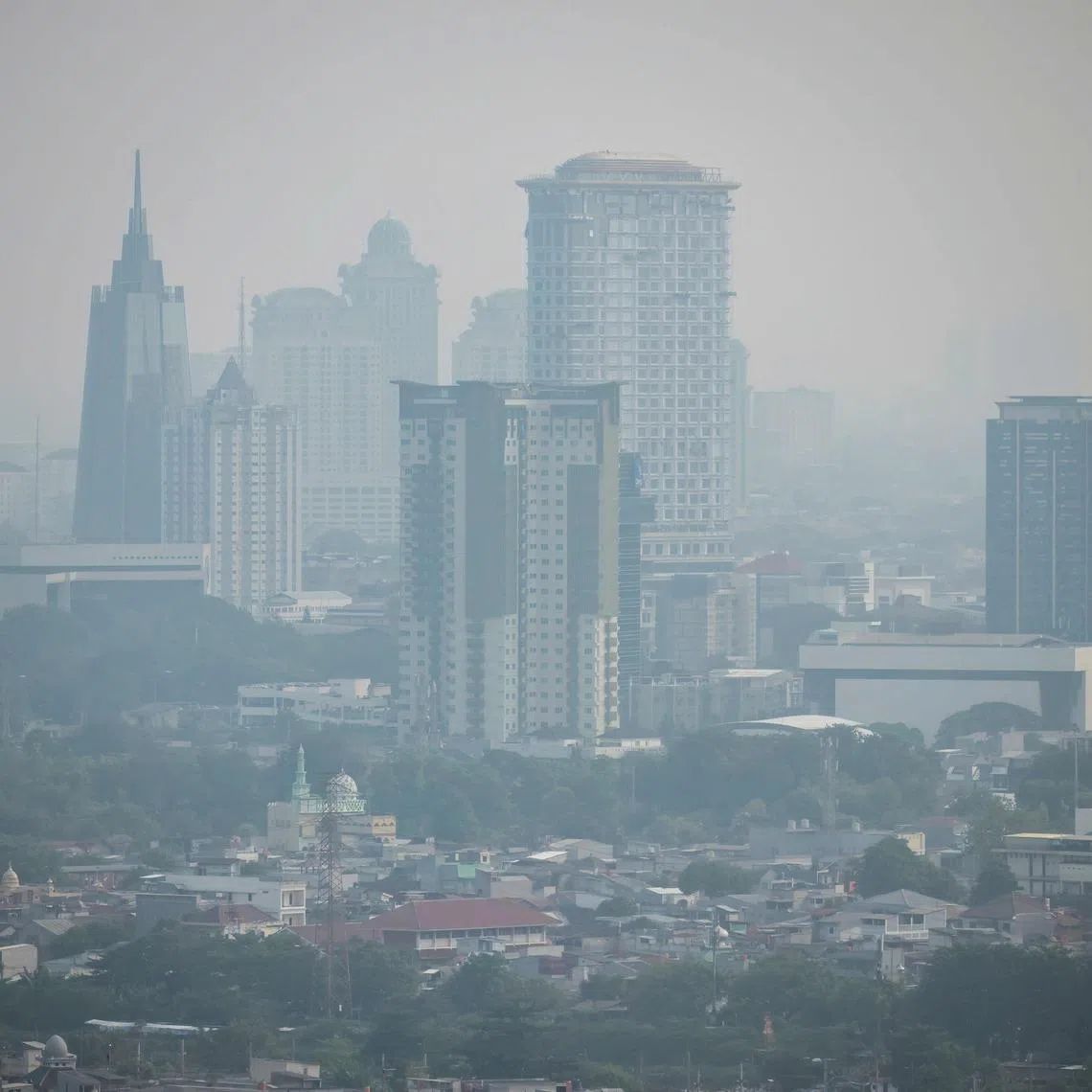Skyscrapers are shrouded in haze in Jakarta on May 7. The worst haze years have been when El Niño and IOD have coincided.