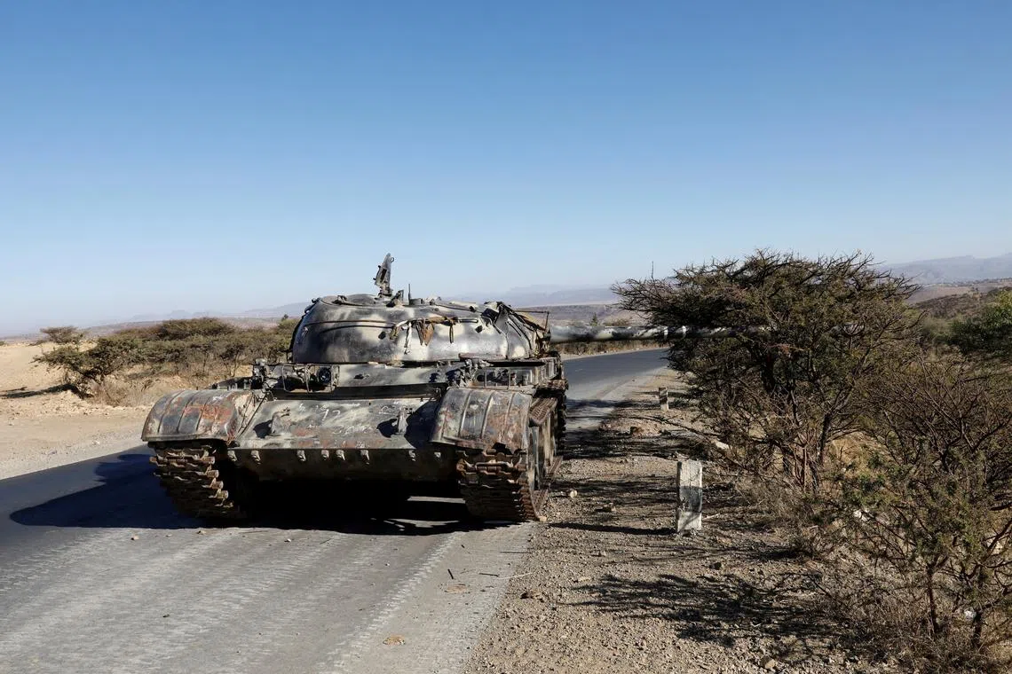 FILE PHOTO: A damaged Eritrean military tank is seen near the town of Wikro, Ethiopia, March 14, 2021.Picture taken March 14, 2021.REUTERS/Baz Ratner/File Photo
