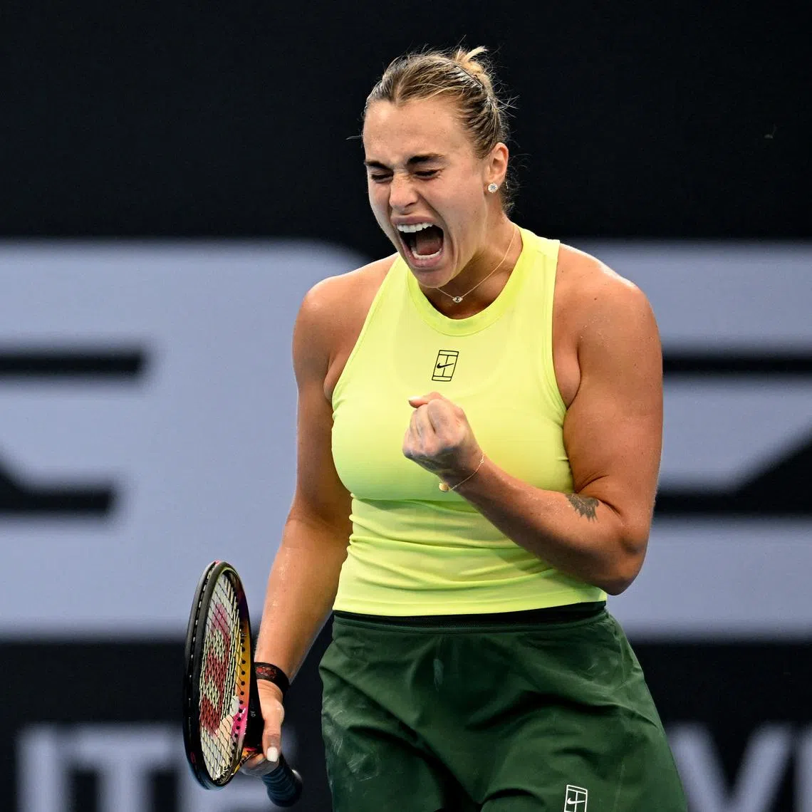 Tennis - Brisbane International Tennis Tournament - Pat Rafter Arena, Brisbane, Australia - January 10, 2026 Belarus' Aryna Sabalenka reacts during her semi final match against Czech Republic's Karolina Muchova REUTERS/Dan Peled