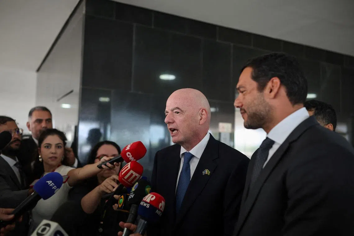 FIFA President Gianni Infantino talks to journalists after a meeting with Brazilian President Luiz Inacio Lula da Silva at the Planalto Palace in Brasilia, Brazil January 26, 2026. REUTERS/Mateus Bonomi