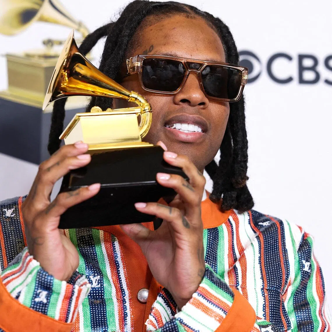 Lil Durk poses with his Grammy for the Best Melodic Rap Performance award during the 66th Annual Grammy Awards in Los Angeles on Feb 4, 2024.