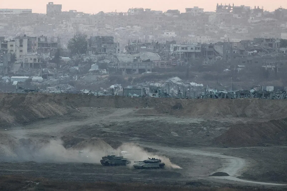 Israeli tanks operate in Gaza, by the Israel-Gaza border, as seen from Israel, on May 3, 2025.