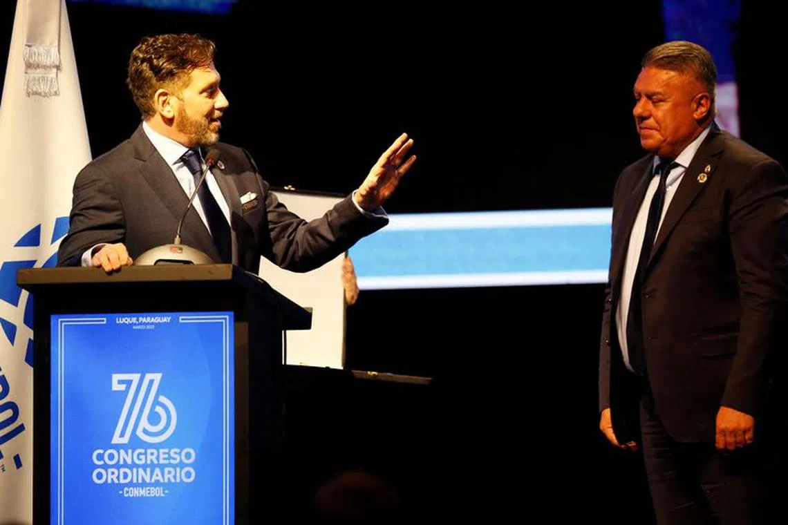 FILE PHOTO: Soccer Football - CONMEBOL Annual Congress - CONMEBOL Headquarters, Luque, Paraguay - March 31, 2023 Conmebol president Alejandro Dominguez with Argentine Football Association president Claudio Tapia during the congress REUTERS/Cesar Olmedo/File Photo