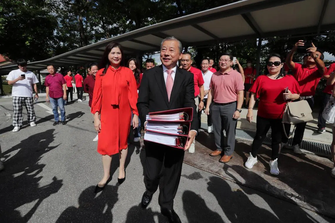 Presidential hopeful George Goh together with his wife Lysa Sumali, submits his presidential election eligibility forms on Aug 4, 2023.