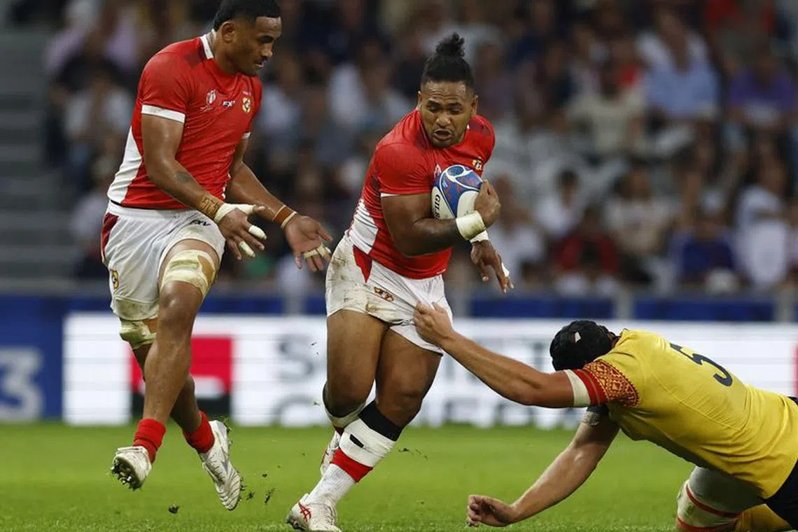 Seven-try Tonga bow out with World Cup win over Romania | The Straits Times