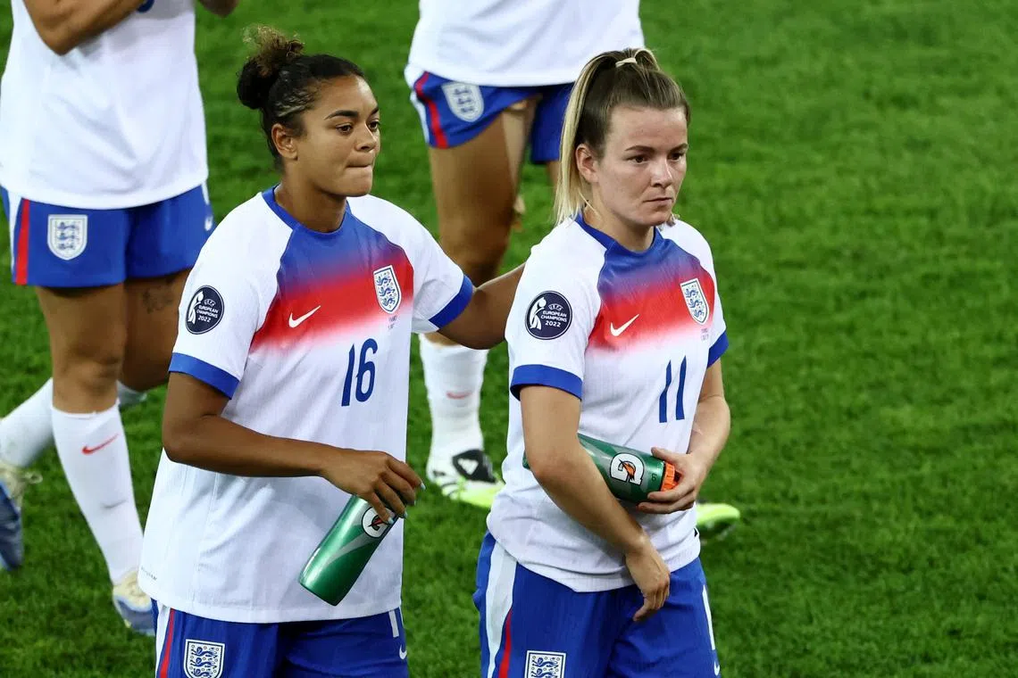 FILE PHOTO: Soccer Football - UEFA Women's Euro 2025 - Group D - France v England - Stadion Letzigrund, Zurich, Switzerland - July 5, 2025 England's Jessica Carter and Lauren Hemp look dejected after the match REUTERS/Stephane Mahe/File Photo