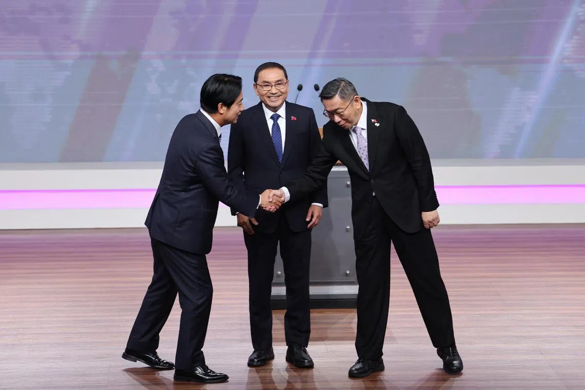 (From left) Democratic Progressive Party's (DPP) Lai Ching-te, opposition Kuomintang's (KMT) Hou Yu-ih, and Taiwan People's Party's (TPP) Ko Wen-je  during a televised presidential election debate in Taipei, on Dec 30, 2023.
