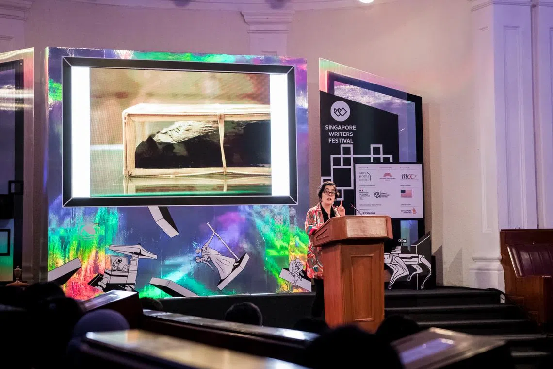 Shubigi Rao delivering her keynote talk, Text Is Thicker Than Water, at The Arts House.