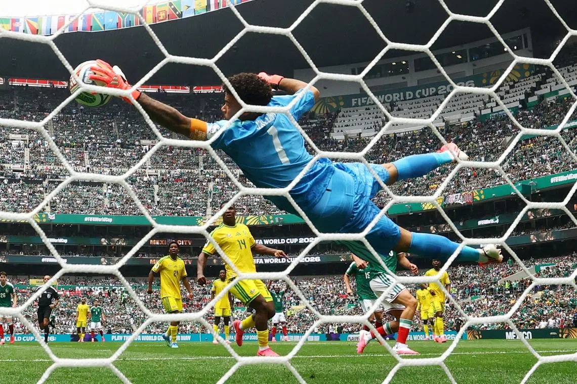 Soccer Football - FIFA World Cup 2026 - Group A - Mexico v South Africa - Estadio Azteca, Mexico City, Mexico - June 11, 2026 South Africa's Ronwen Williams makes a save REUTERS/Kai Pfaffenbach