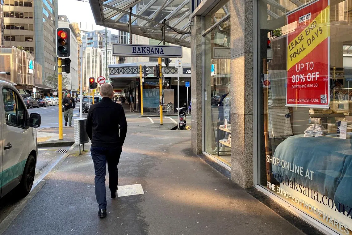 While strong immigration and a tourism recovery are aiding activity, steep borrowing costs are curbing consumer spending and business investment. 