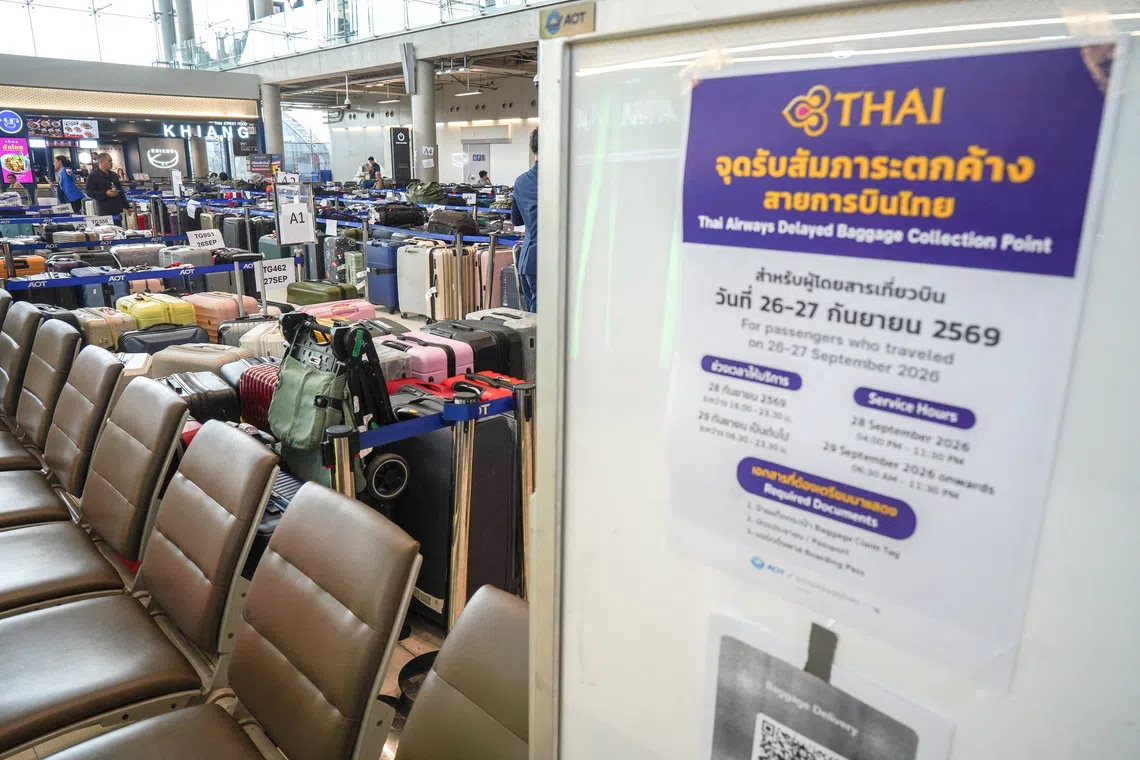 Baggage from Thai Airways flights at Suvarnabhumi International Airport in Bangkok on Sept 29 after heavy rain and flooding disrupted the airline’s ground operations.