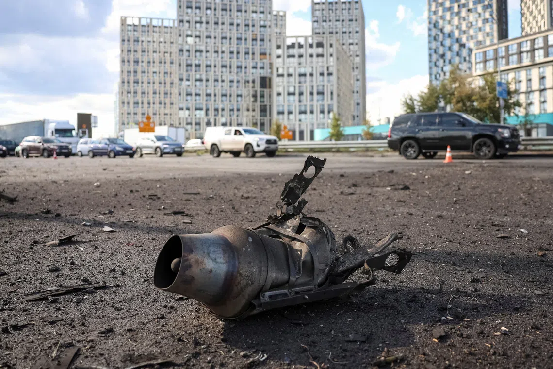 Part of a jet drone lying on a road on Sept 3, at the site of a Russian drone attack in the Ukrainian capital, Kyiv.