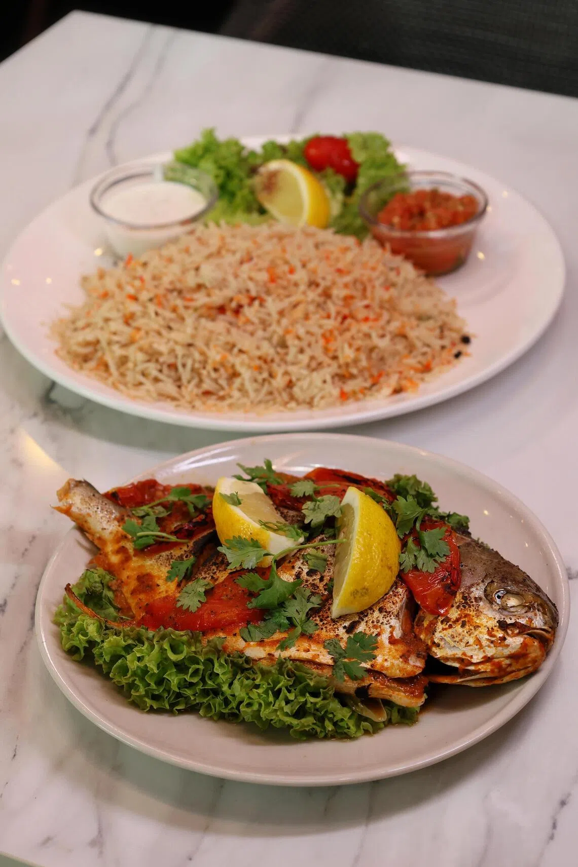 Mandhi Fish with golden pomfret at Hadramawt Kitchen.