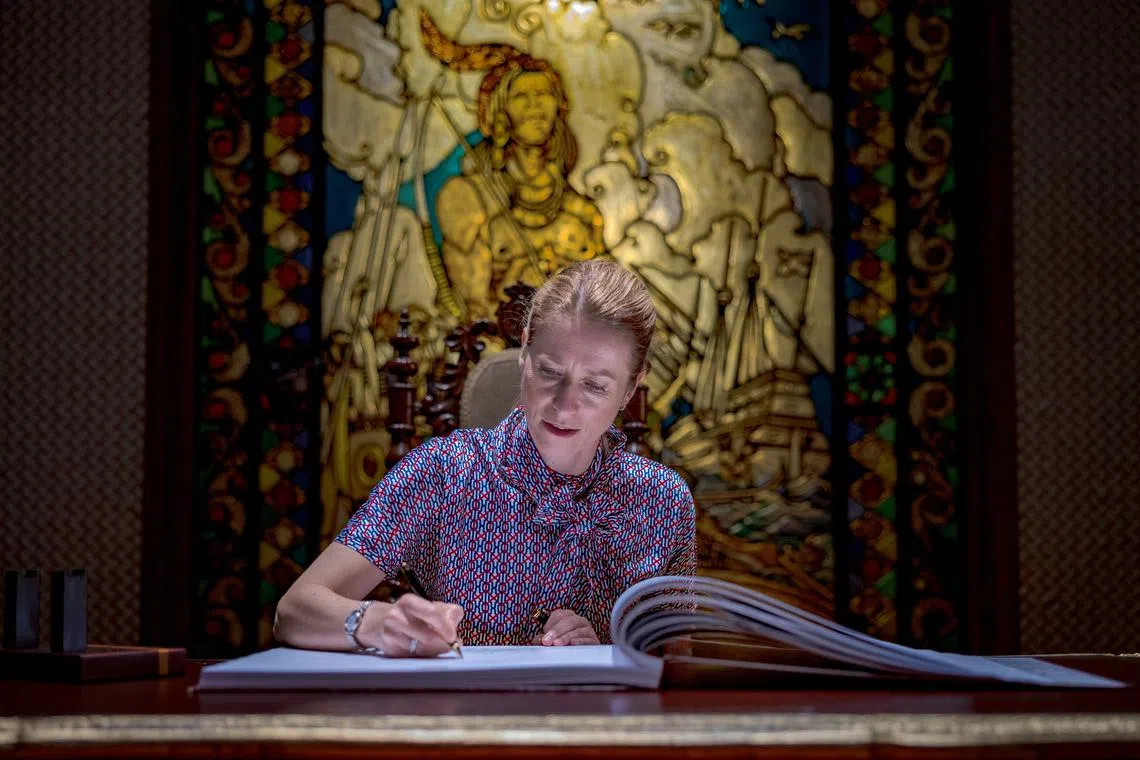 FILE PHOTO: Vice-President of the European Commission Kaja Kallas signs a guestbook before meeting with Philippine President Ferdinand Marcos Jr at Malacanang Palace in Manila, Philippines, June 2, 2025. Ezra Acayan/Pool via REUTERS/File Photo