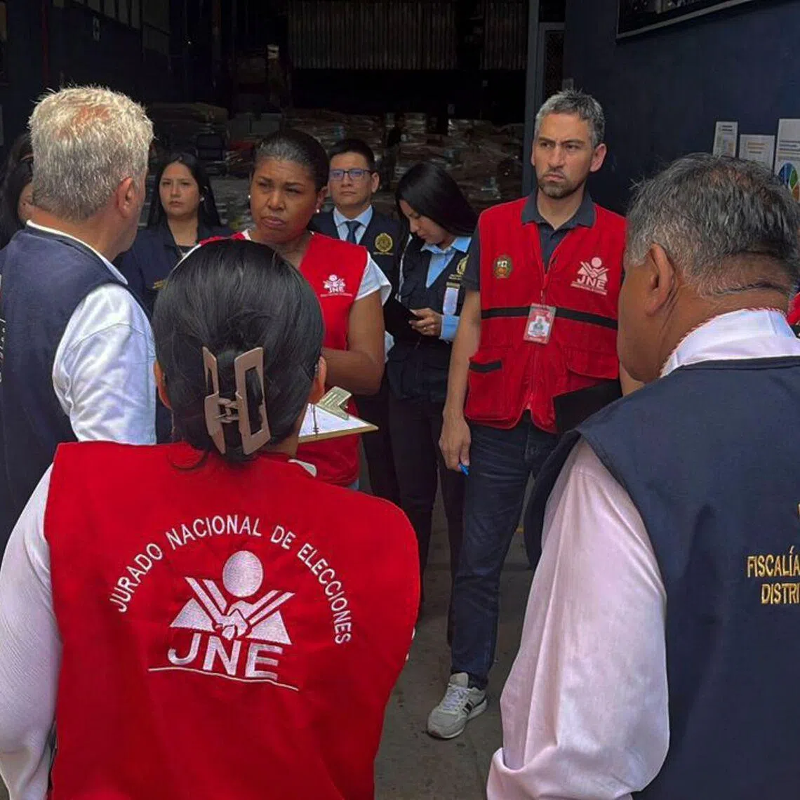 Prosecutors raid a warehouse where the National Office of Electoral Processes stores electoral material in Lima.