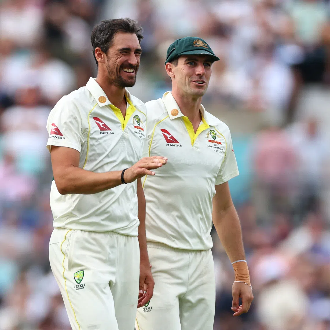 FILE PHOTO: Cricket - Ashes - Fifth Test - England v Australia - The Oval, London, Britain - July 29, 2023  Australia's Mitchell Starc celebrates with Pat Cummins after taking the wicket of England's Chris Woakes caught by Usman Khawaja Action Images via Reuters/Andrew Boyers/File Photo