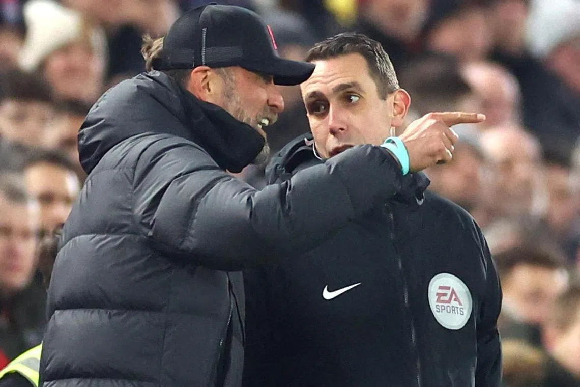 Then Liverpool manager Jurgen Klopp remonstrates with fourth official David Coote during the Premier League match against Everton at Anfield on Feb 13, 2023.