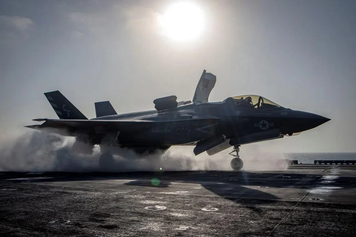 A F-35B Lightning II aircraft from the Marine Fighter Attack Squadron 211 launches from the deck aboard the amphibious assault ship USS Essex as part of the F-35B's first combat strike, against a Taliban target in Afghanistan, September 27, 2018.  Mass Communication Specialist 3rd Class Matthew Freeman/U.S. Navy/Handout via REUTERS/File photo