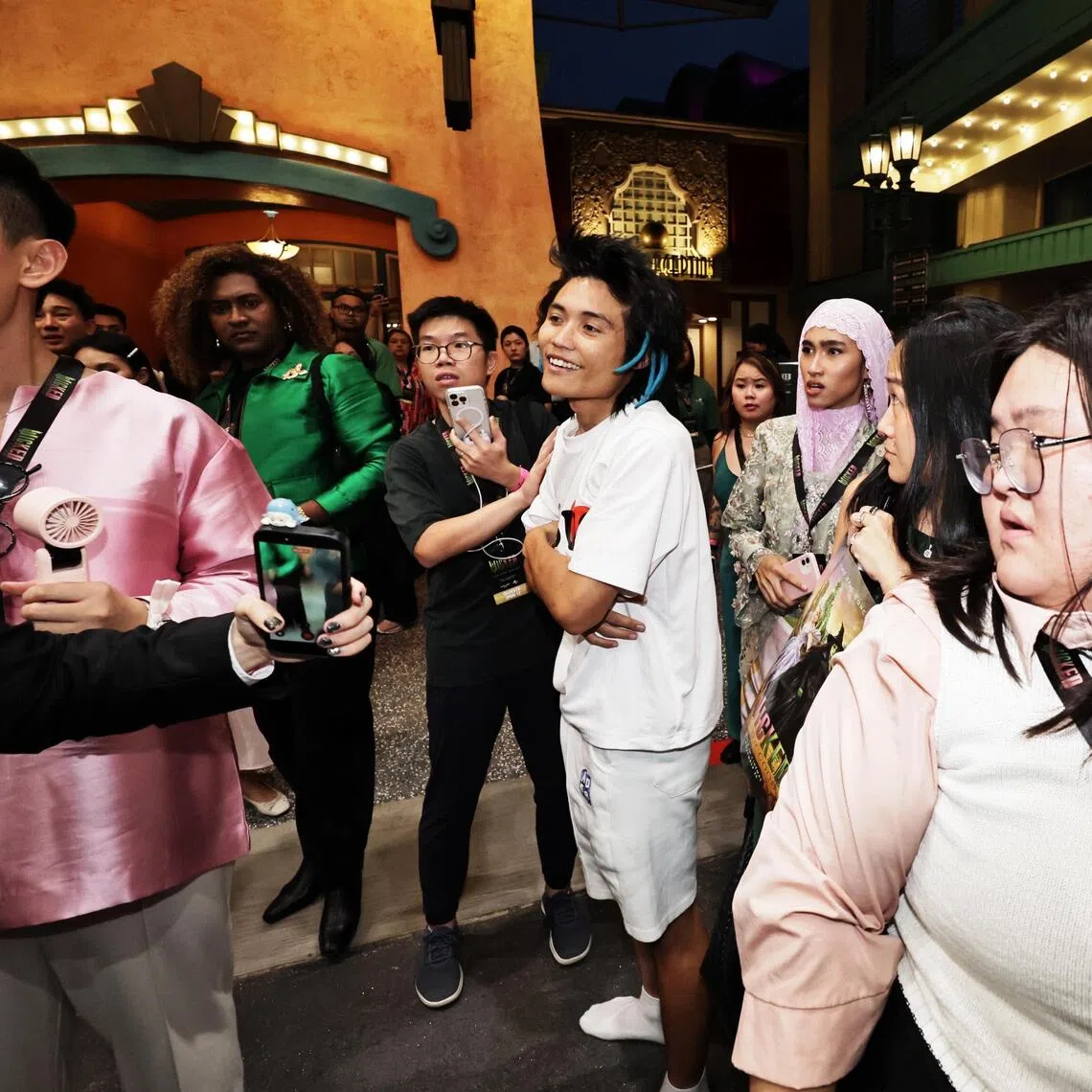 Australian national Johnson Wen at the Wicked: For Good premiere in Singapore on Nov 13, pictured moments after he had been thrown off the yellow carpet by security for attacking pop star Ariana Grande. He marred what was meant to be a momentous night for Singapore. 