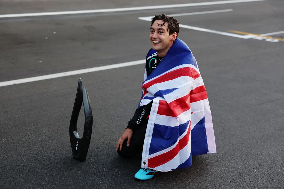 Formula One F1 - Azerbaijan Grand Prix - Baku City Circuit, Baku, Azerbaijan - September 26, 2026 Mercedes' George Russell celebrates after winning the race REUTERS/Ramil Sitdikov