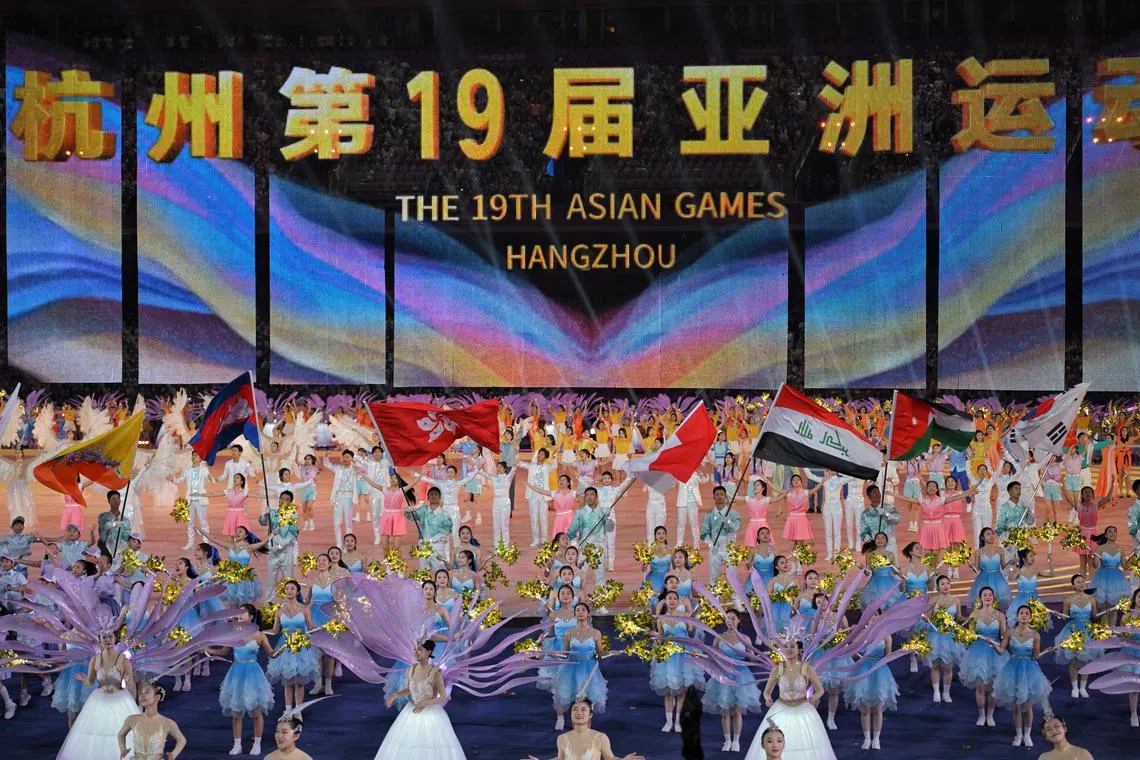 Performers in front of a digital screen during a segment of the opening ceremony of the 19th Asian Games held at the Hangzhou Olympic Sports Center Stadium on Sept 23.