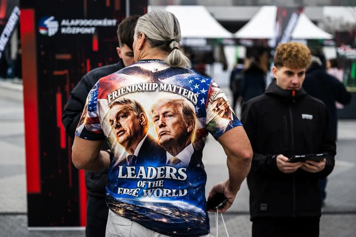 An attendee arrives at the Conservative Political Action Conference (CPAC) in Budapest, Hungary, March 21, 2026. REUTERS/Marton Monus