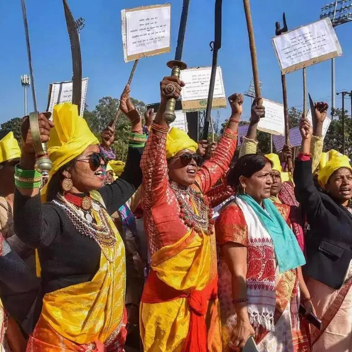 Sarna tribals with their traditional weapons stage a rally in Jharkhand. PHOTO: JANAJATI SURAKSHA MANCH 