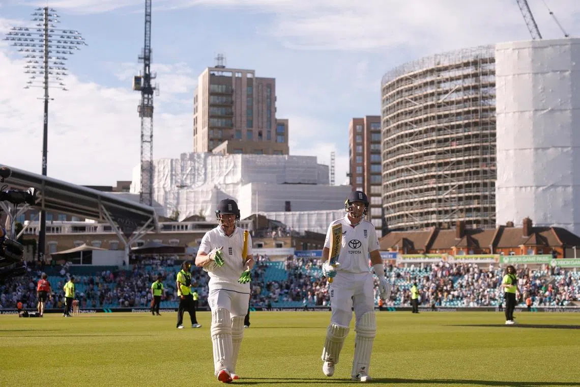 Cricket - England v New Zealand - Second Test - Kia Oval, London, Britain - June 20, 2026 England's Joe Root and Jordan Cox walk off the field at stumps on day 4 Action Images via Reuters/Andrew Couldridge