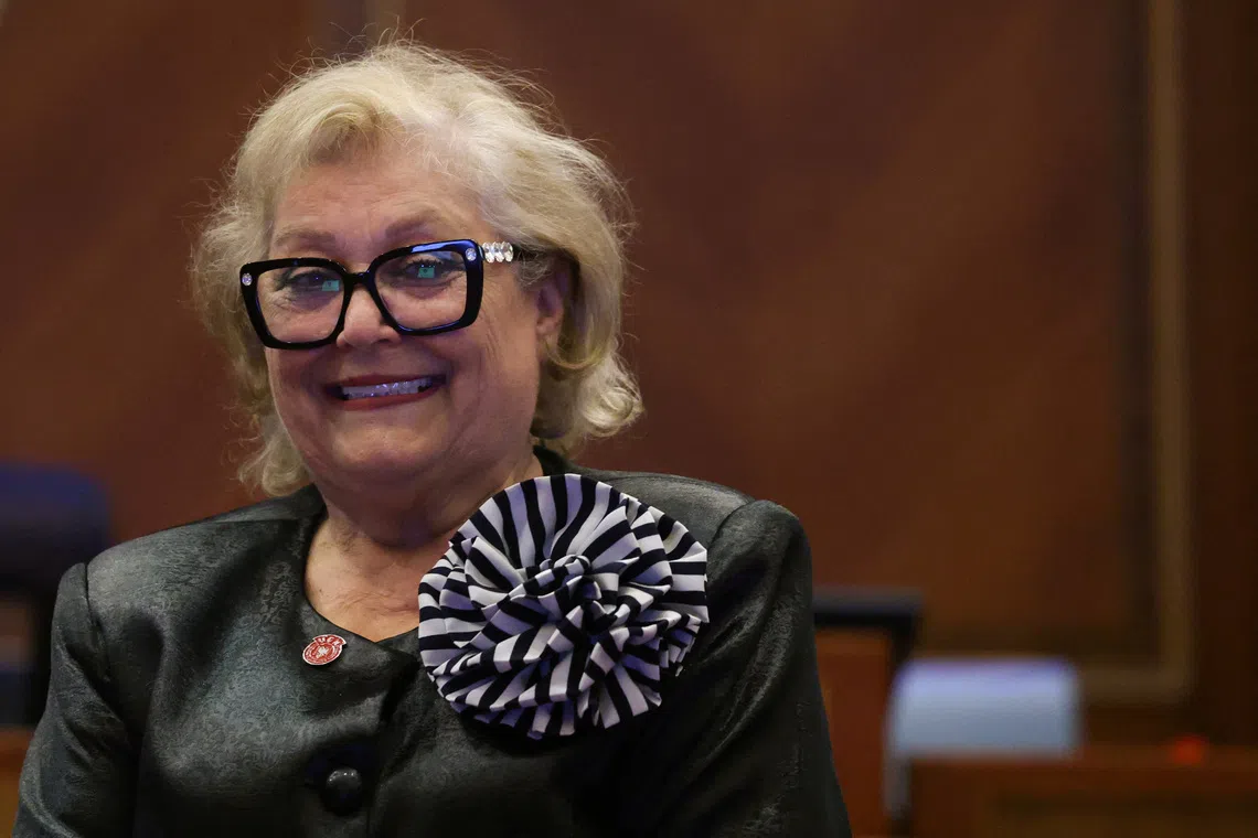 The newly elected President of the Republic of Kosovo Justina Shiroka Pula poses for pictures at the parliament in Pristina, Kosovo, October 7, 2026. REUTERS/Valdrin Xhemaj