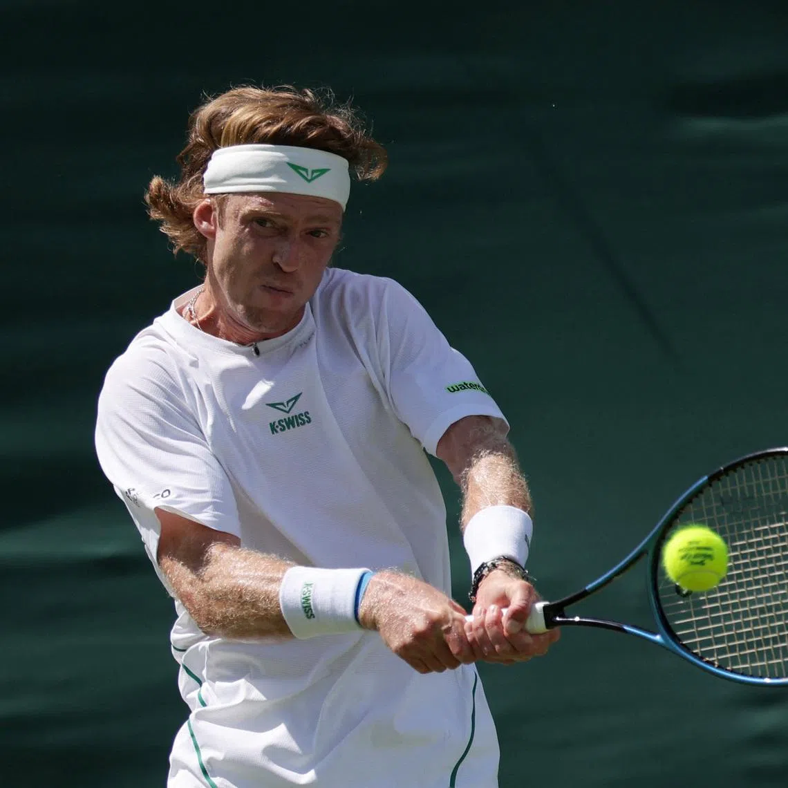 Tennis - Wimbledon - All England Lawn Tennis and Croquet Club, London, Britain - June 29, 2026 Russia's Andrey Rublev in action during his first round match against Russia's Roman Safiullin REUTERS/Marko Djurica